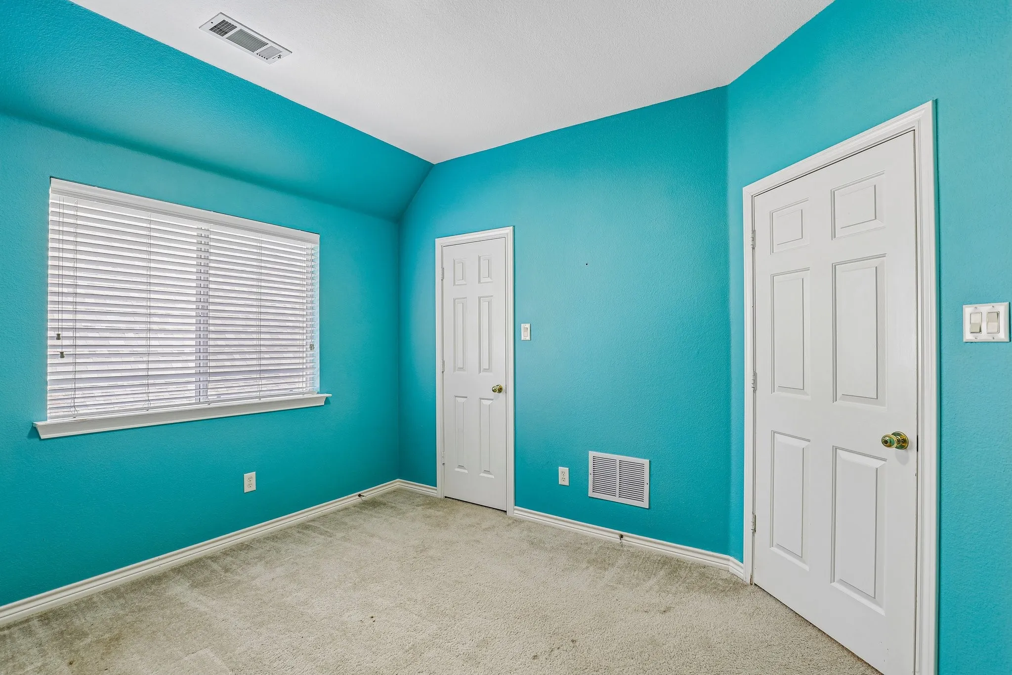 Upstairs bedroom with walk-in closet.