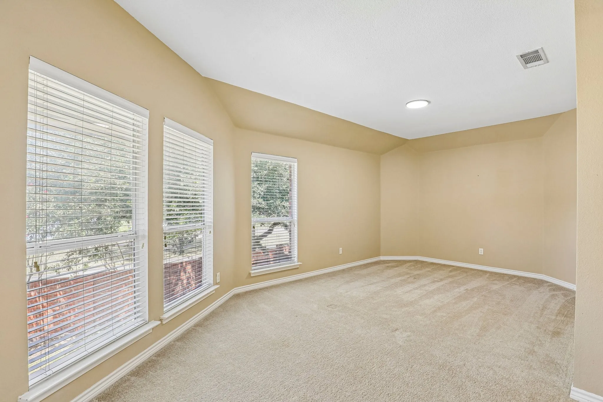 Upstairs bonus room with natural light.