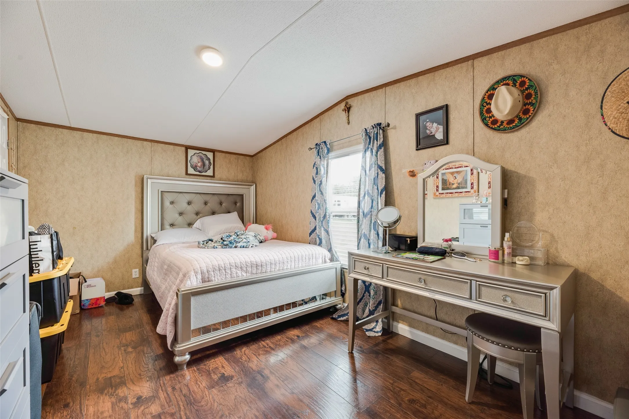 Recessed lighting, wood-finish flooring, and window with blinds