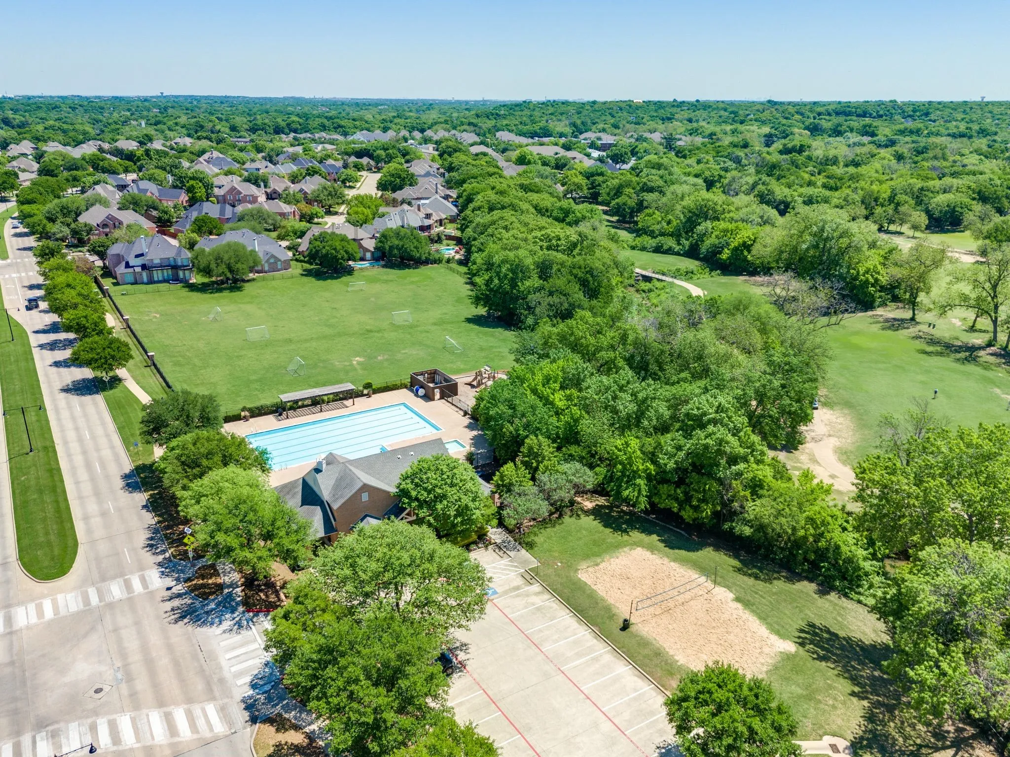 Community pool, soccer fields, sand volleyball, & playground