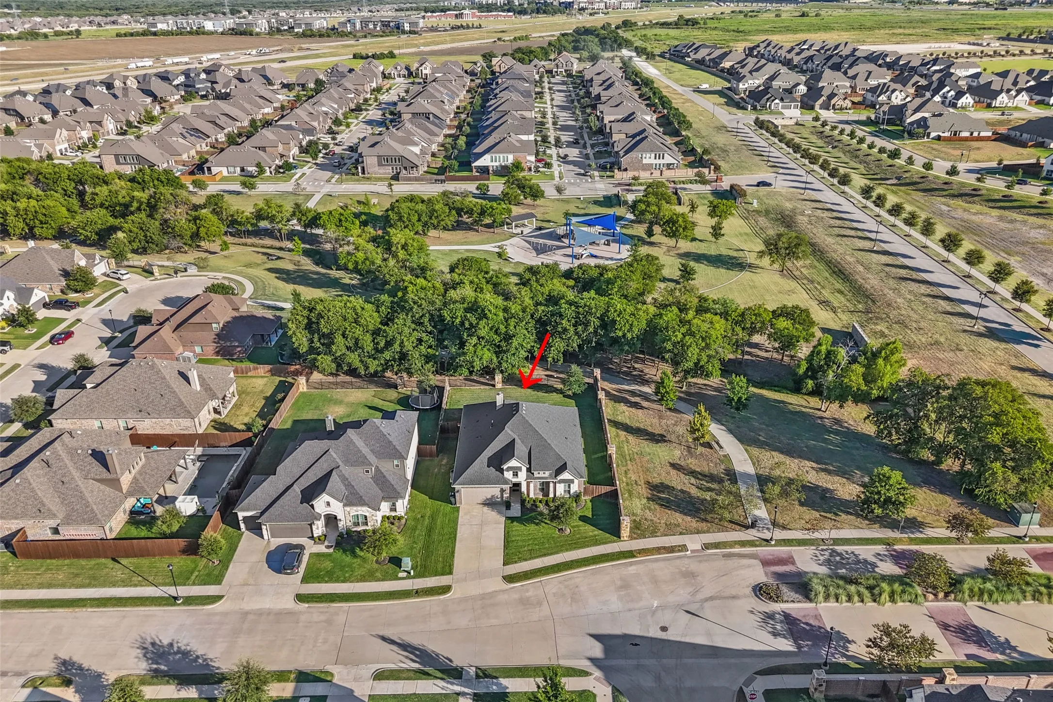 Great curb appeal with only one next door neighbor and green space behind