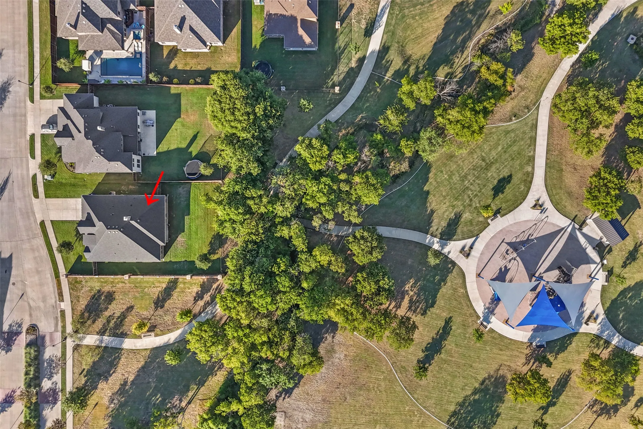 Located by walking trails and the neighborhood park