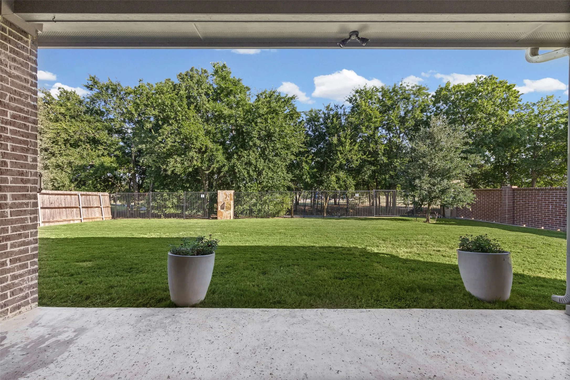 Enjoy your morning coffee on this huge covered patio looking at the trees