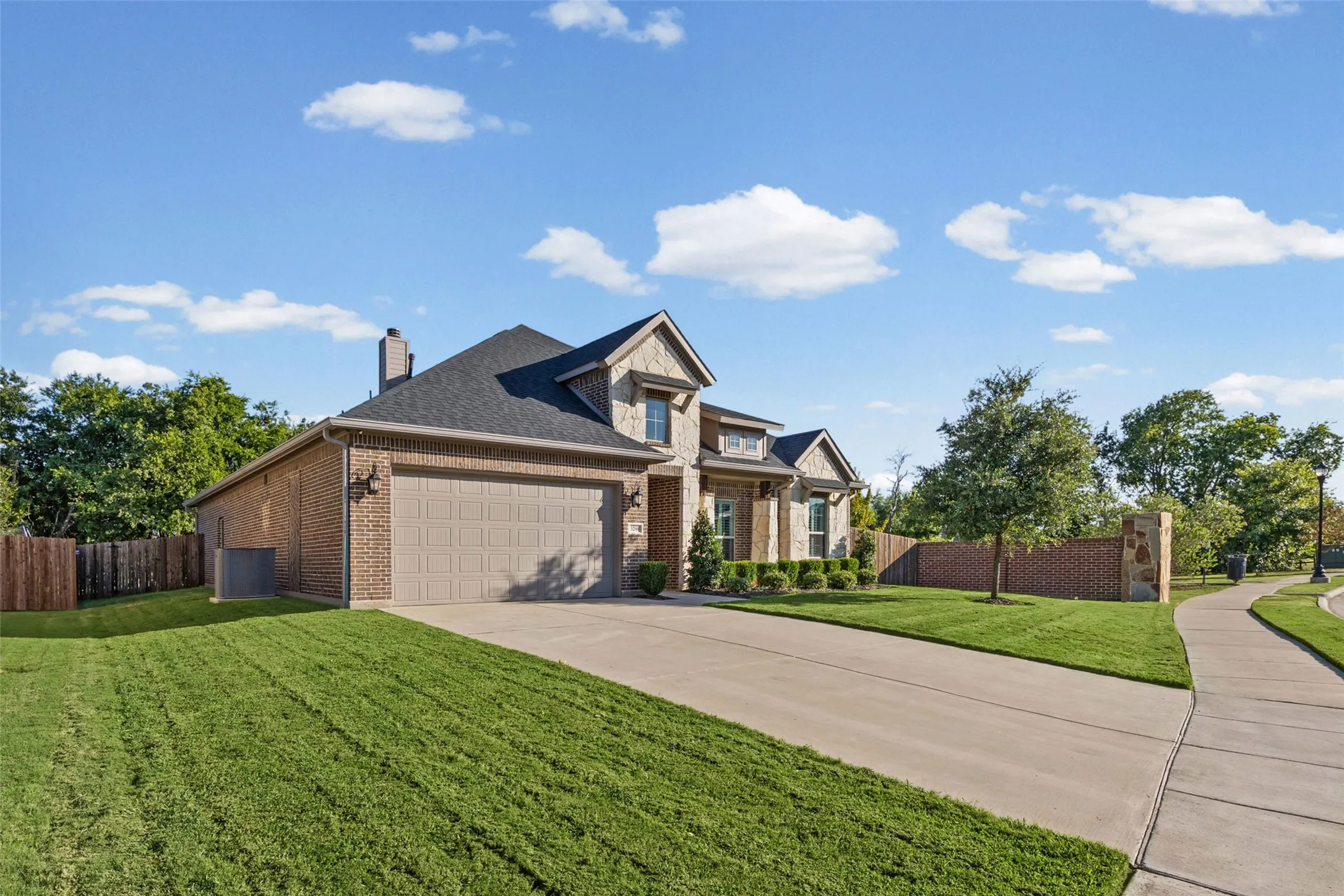 Great curb appeal with only one next door neighbor and green space behind