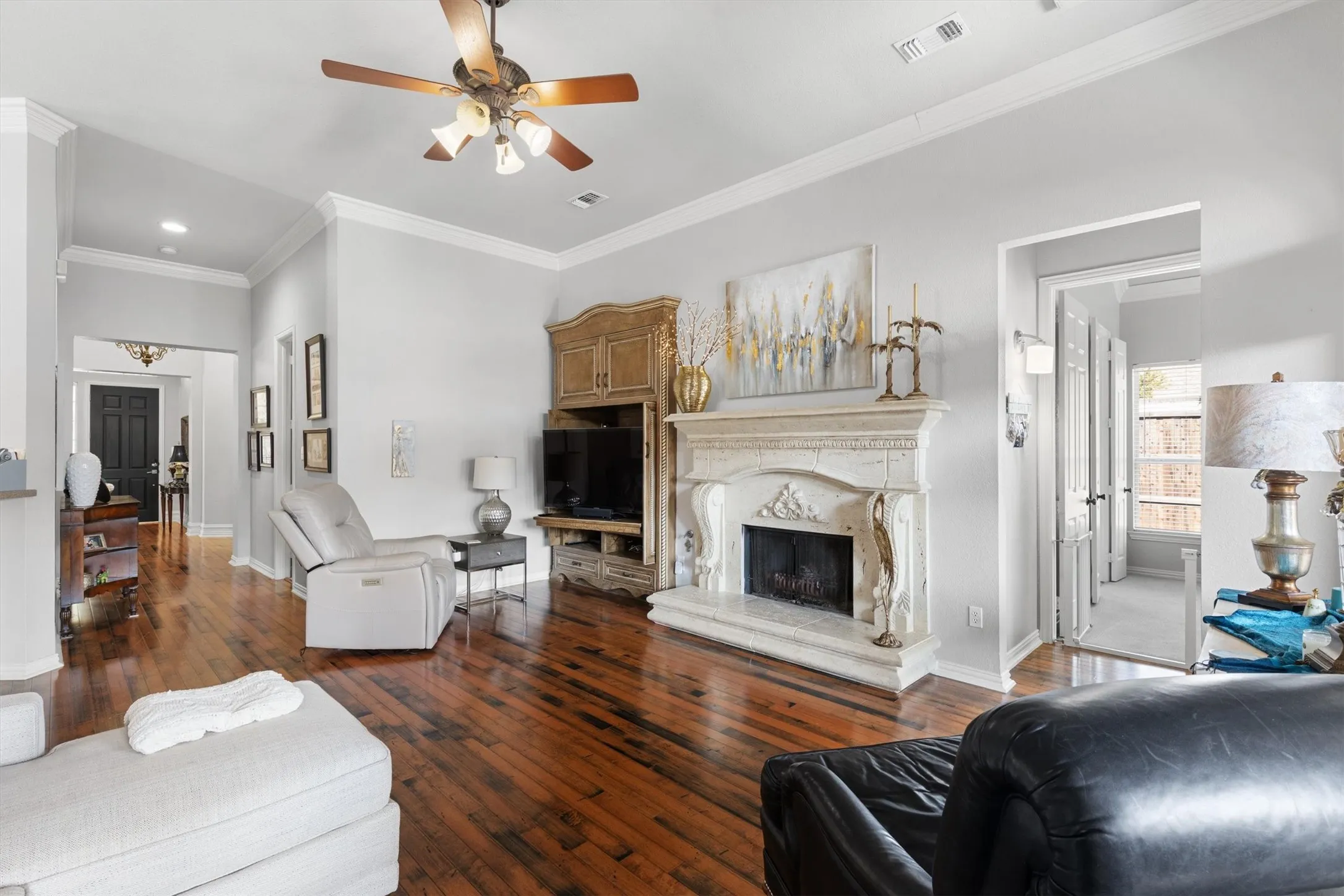 Custom fireplace 10ft ceilings throughout.