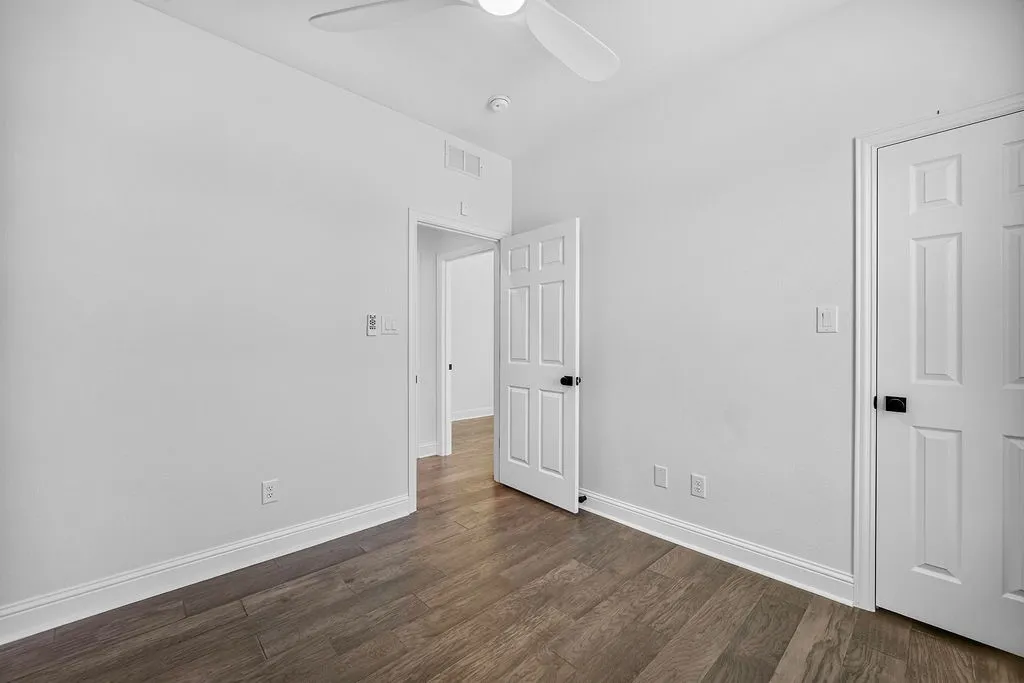 Wood-finish flooring with crisp white walls