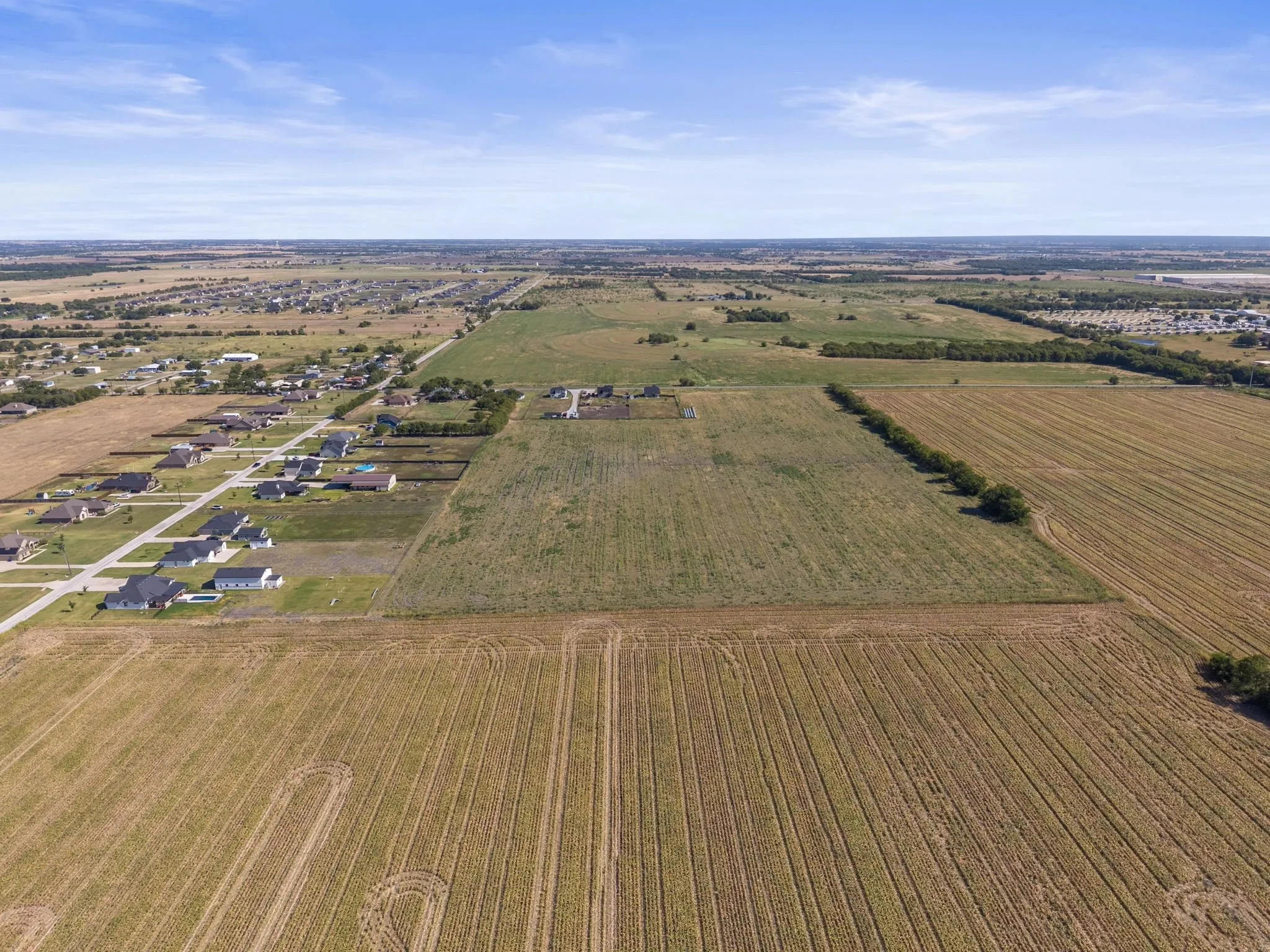 Expansive agricultural land with distinct field patterns