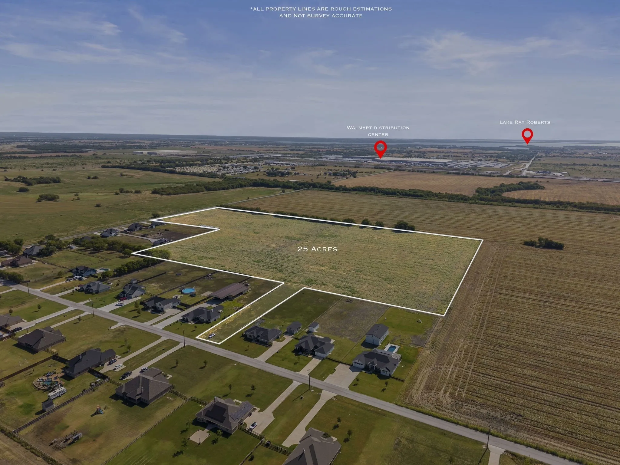 25-acre undeveloped land parcel featuring a flat topography and surrounding residential properties