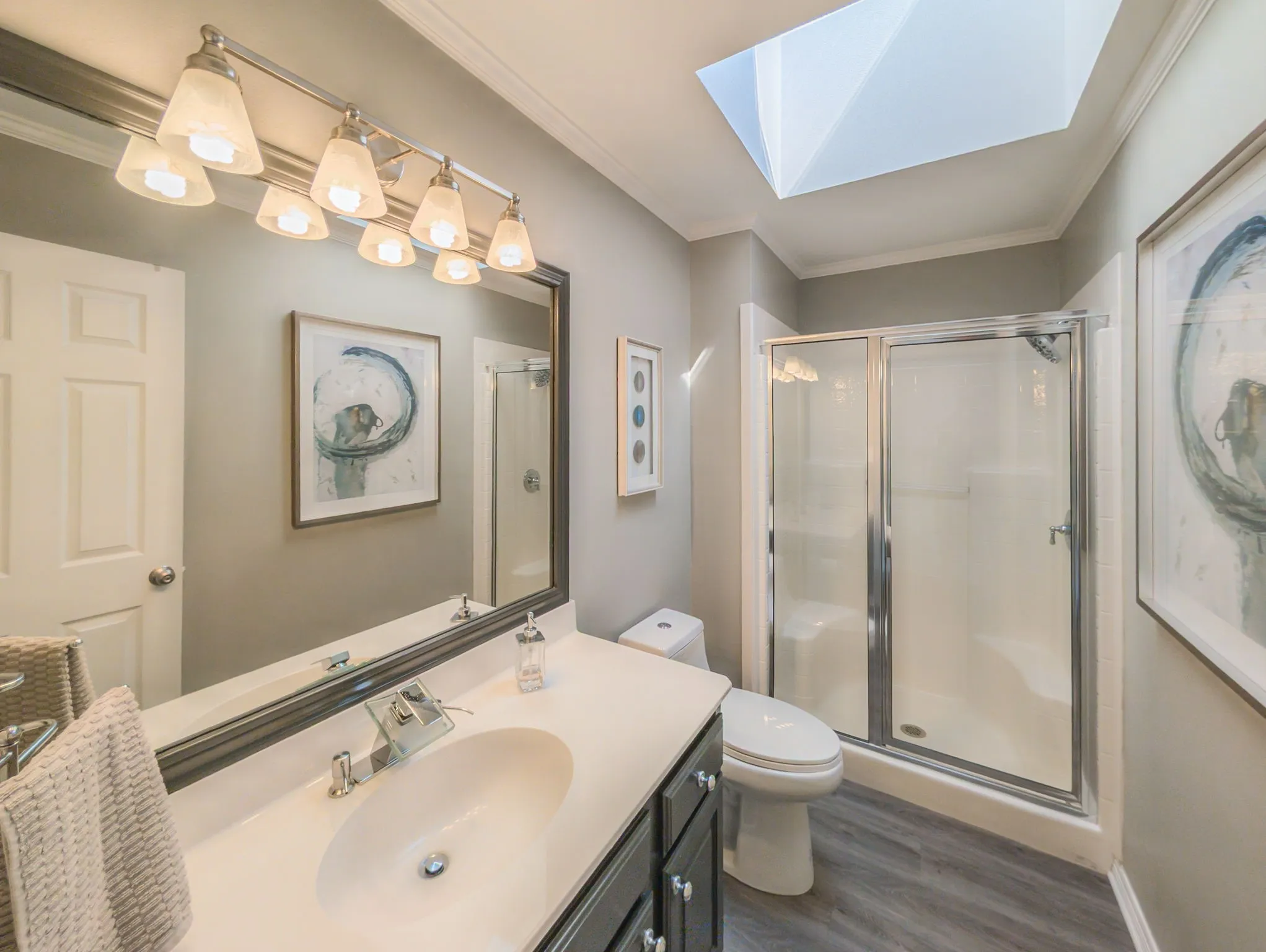 Hall bath with skylight.