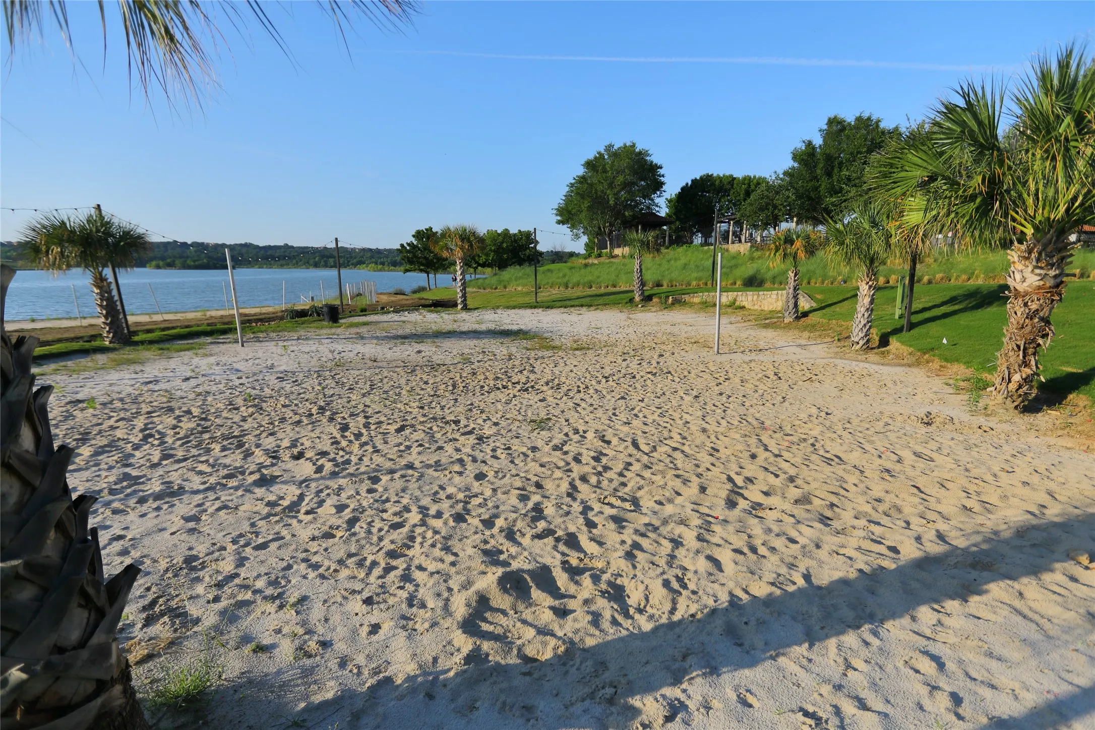 Beach volleyball court with sand surface