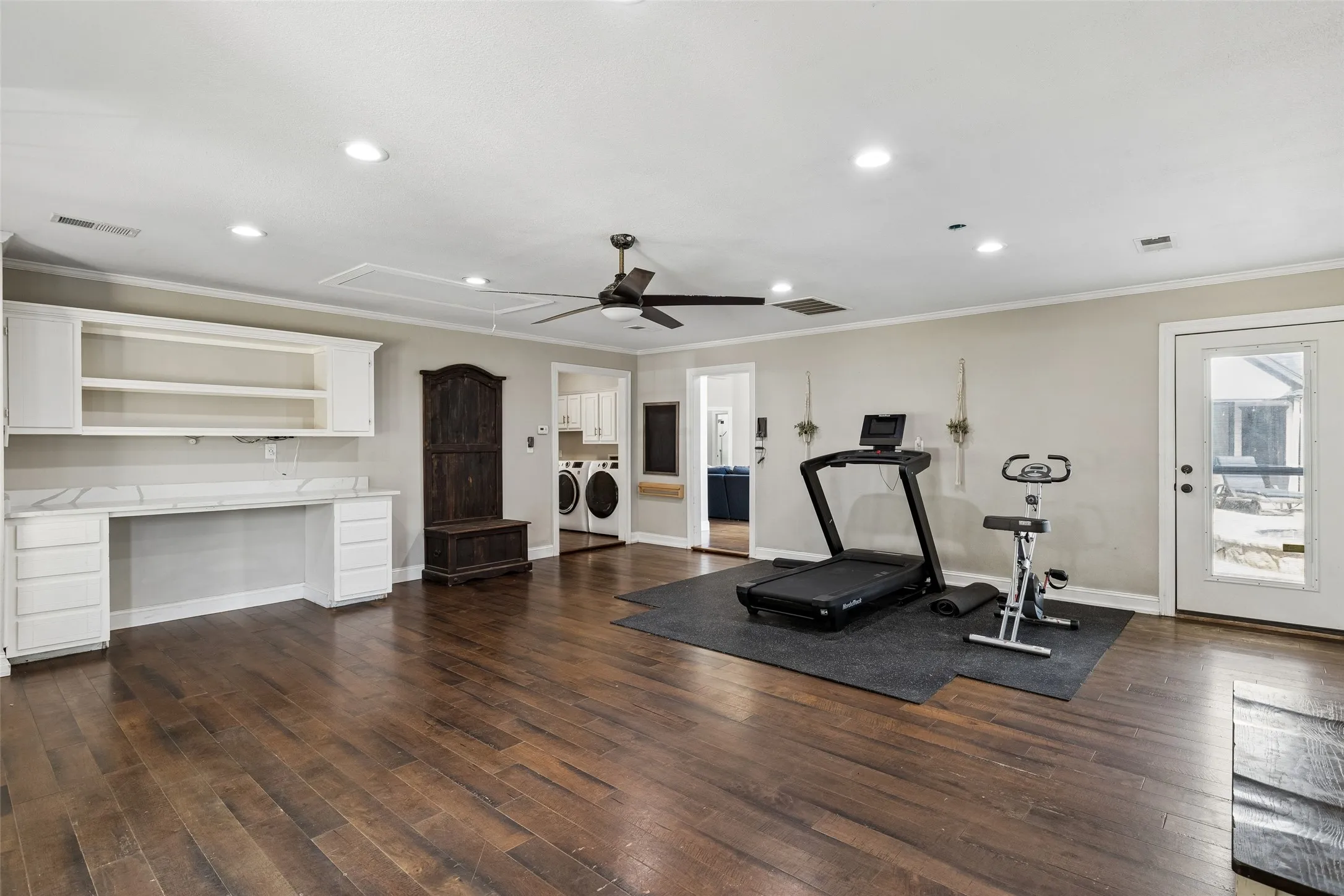 Wood-finish flooring, recessed lighting, and a ceiling fan
