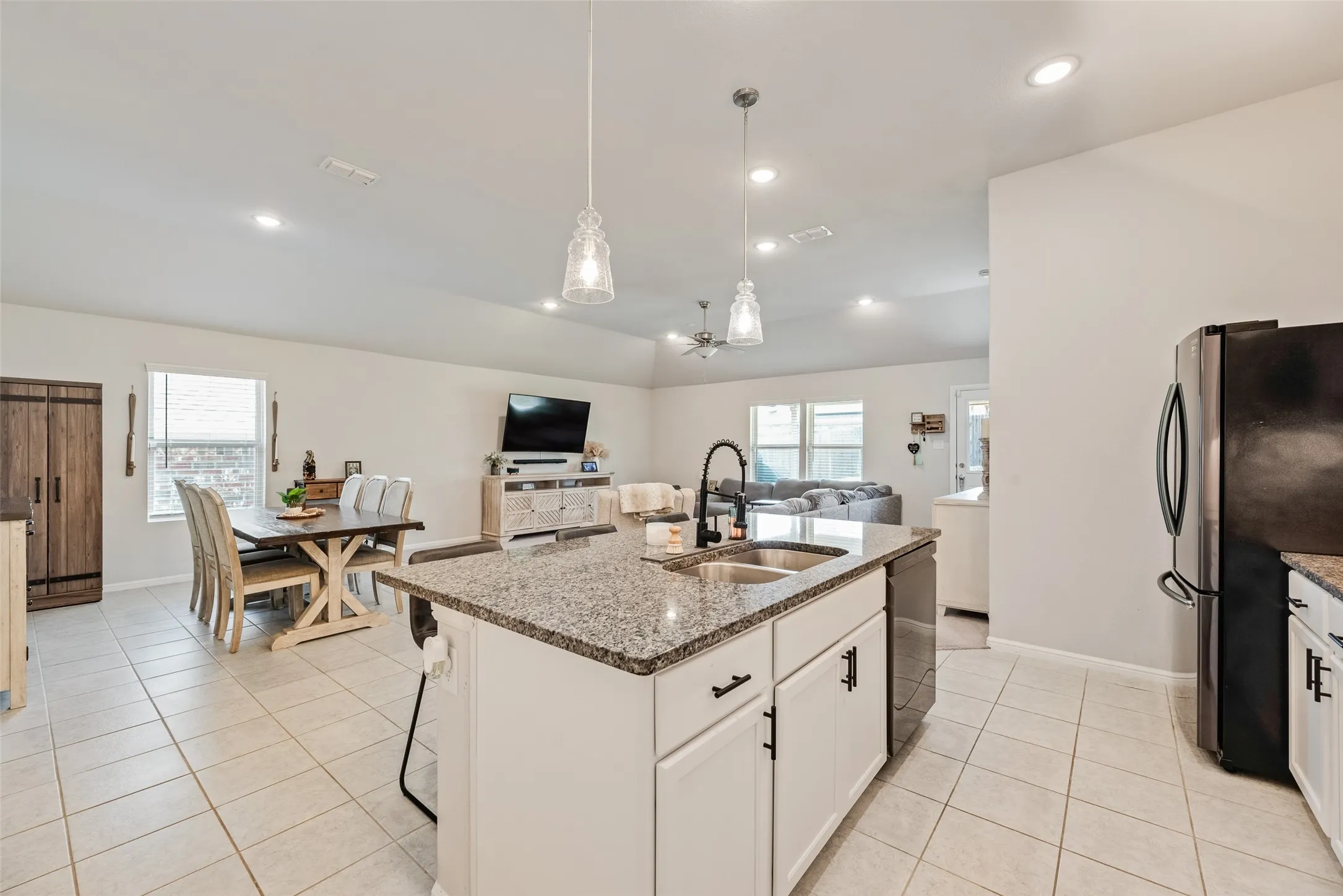 Kitchen island with granite countertop and double basin sink