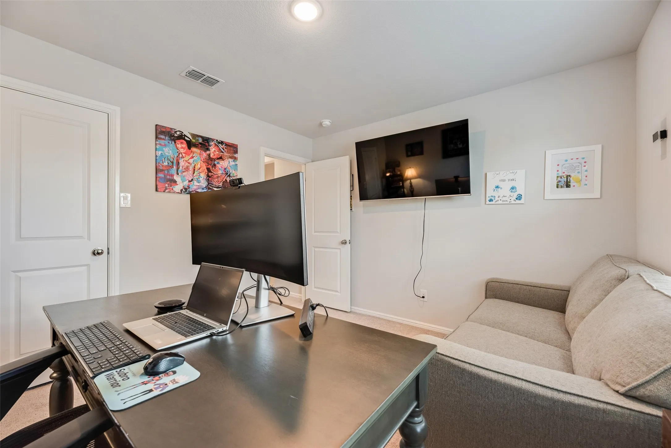 Recessed ceiling lighting, carpet flooring, and two panel doors