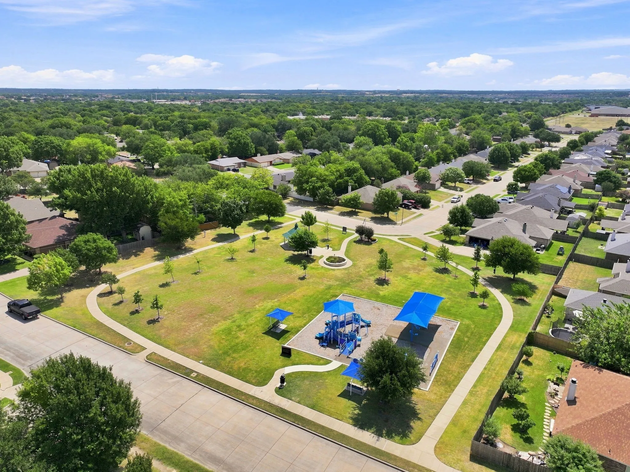 Elk Ridge Park - neighborhood park featuring a covered playground & paved walking path