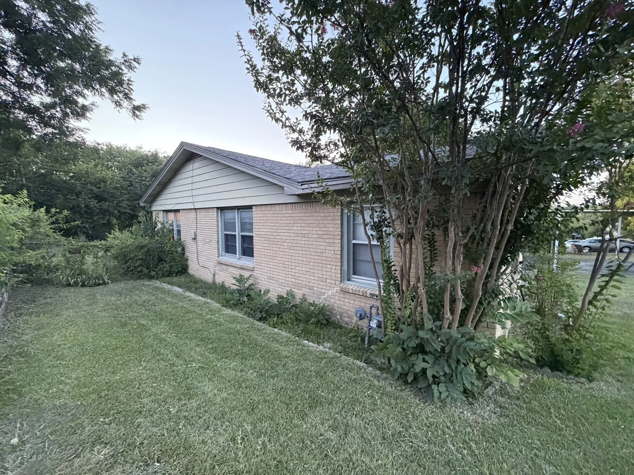 Left side yard - spacious with curb appeal