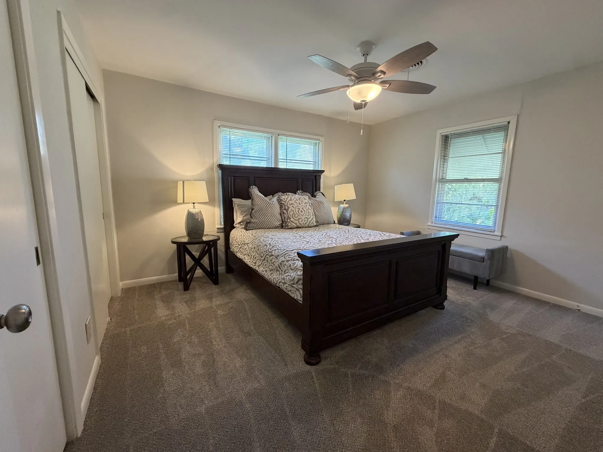 Master bedroom with natural light from several windows