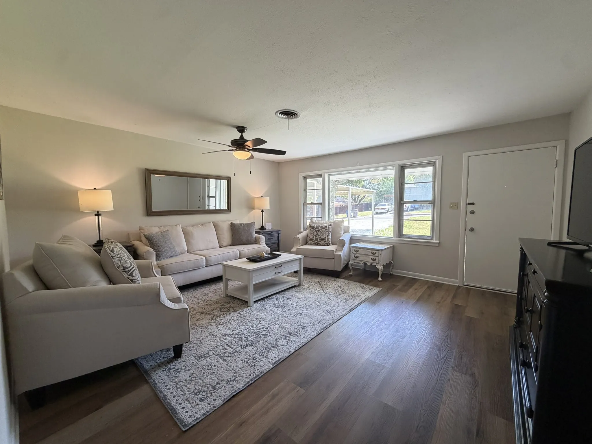 Living area with large front window
