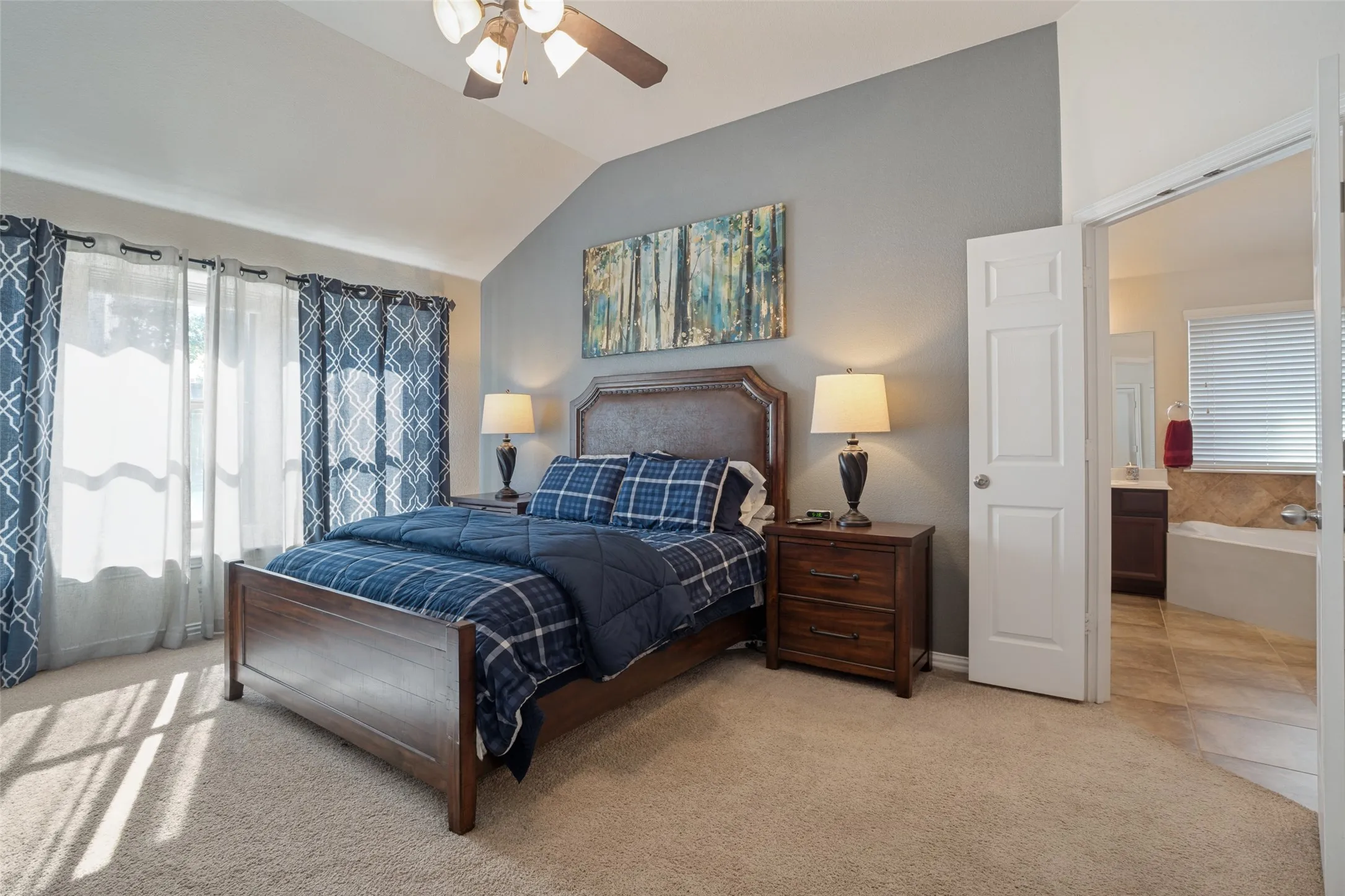 Spacious Primary with a door to access the patio