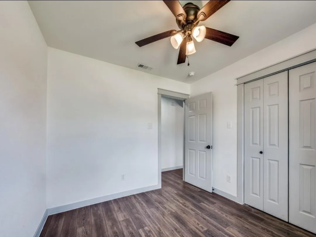 Wood-finish flooring with white walls