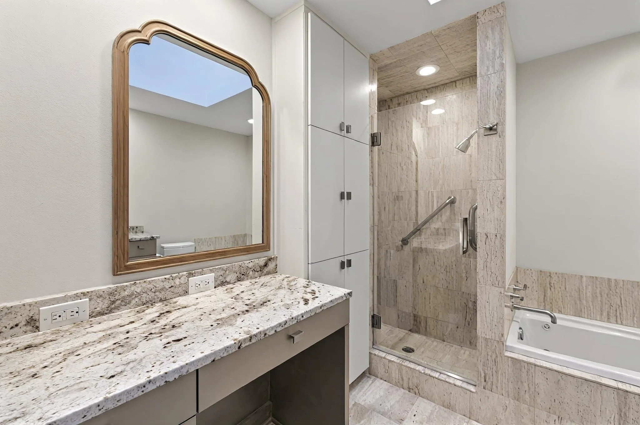 Stone countertop vanity with integrated storage