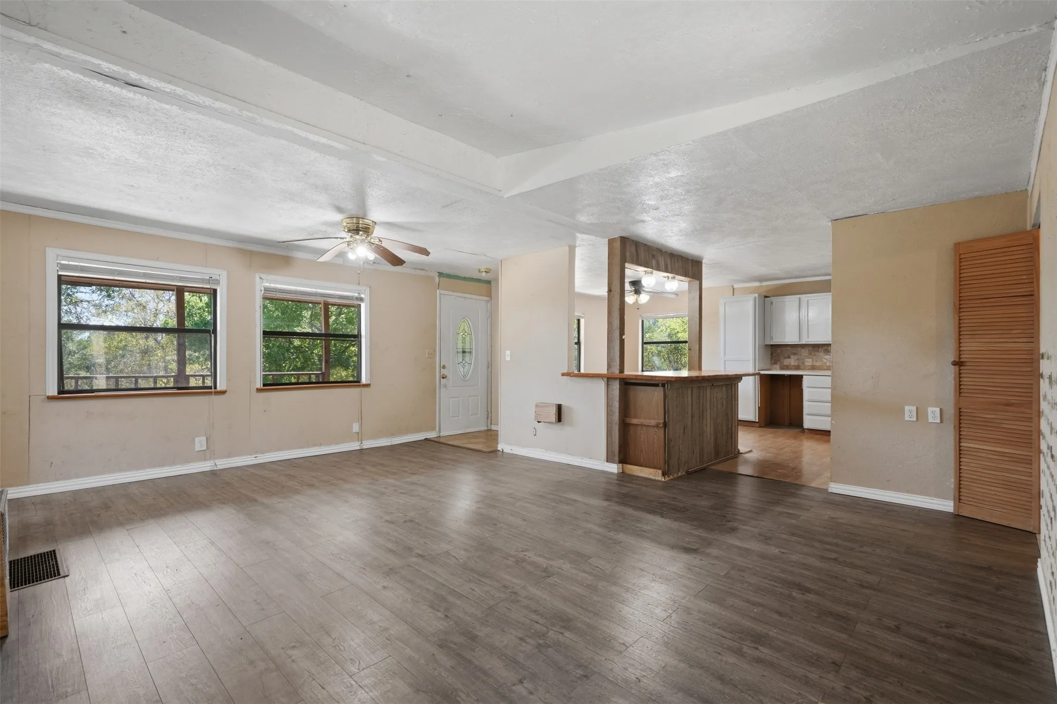 Wood-finish flooring throughout the main living area