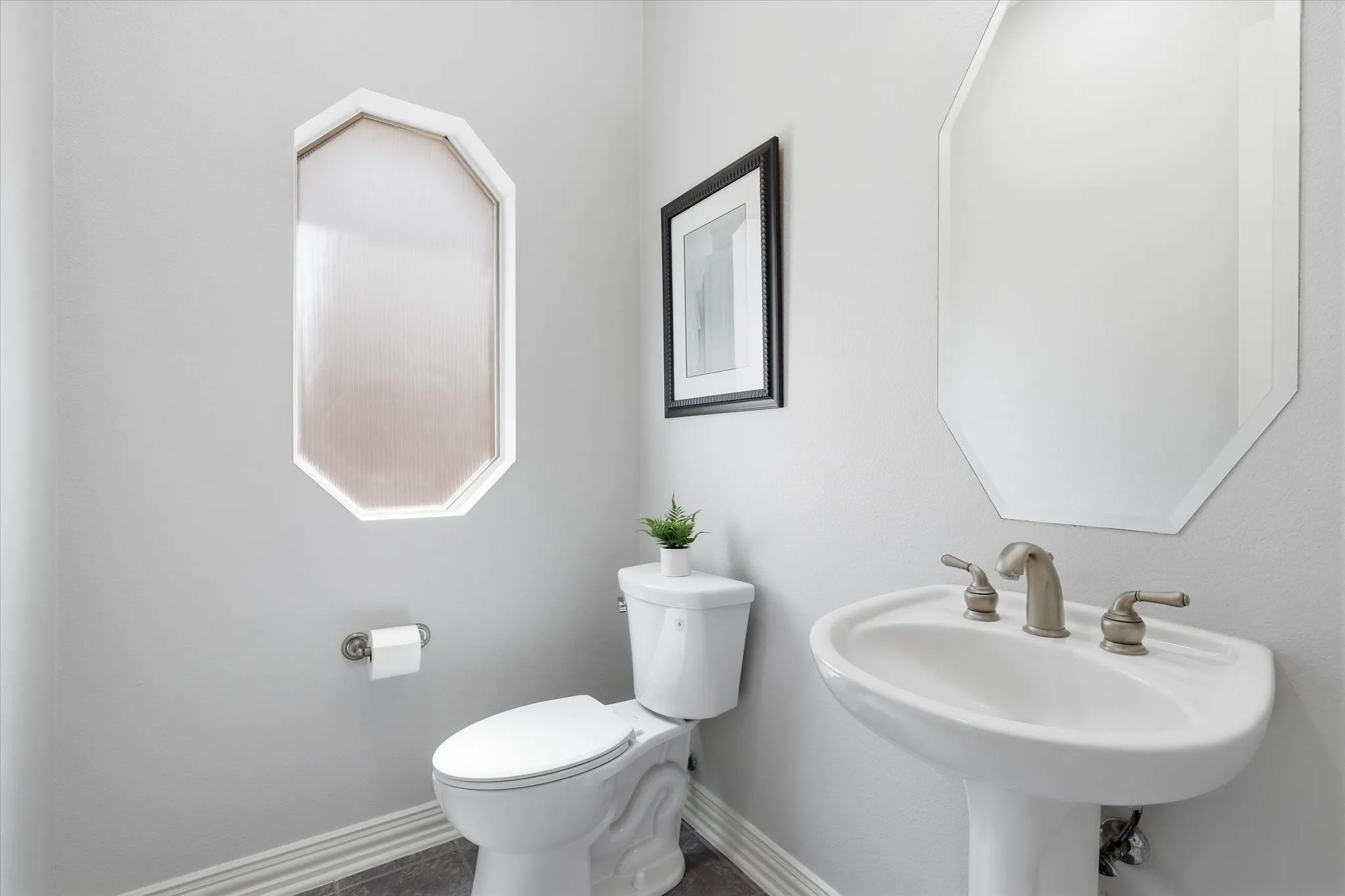 Half bath just outside the office is convenient for work and Guests.