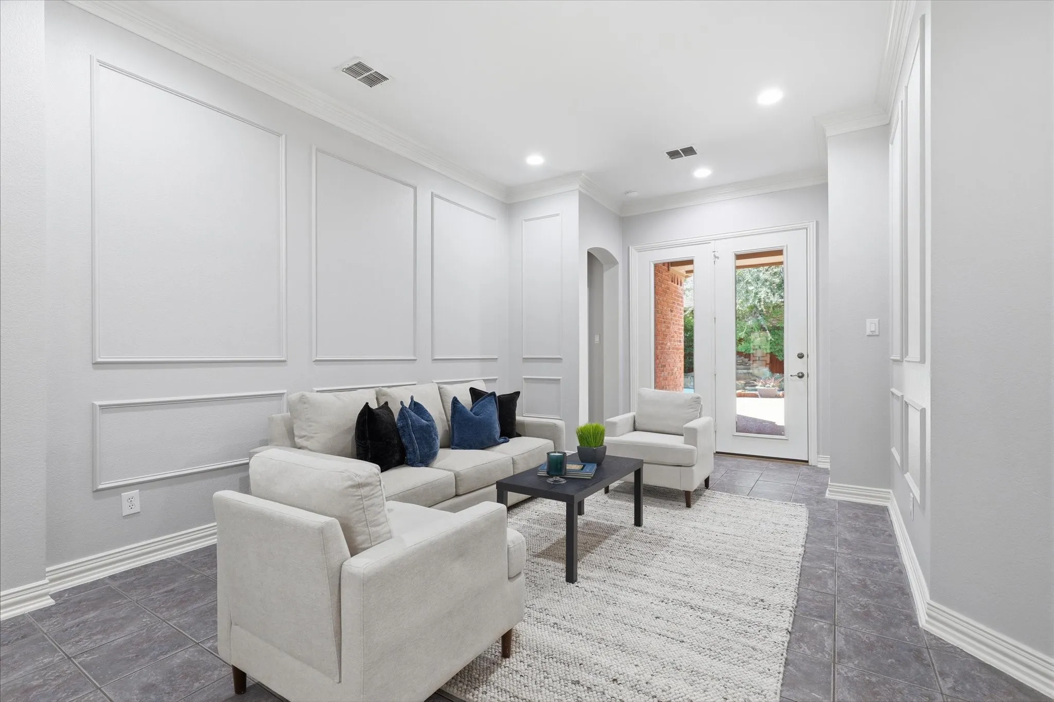 The Front Living room is flexible, it could be a Whiskey tasting room or so many other creative ideas.  Seller's just used it as an Extra Living Area.