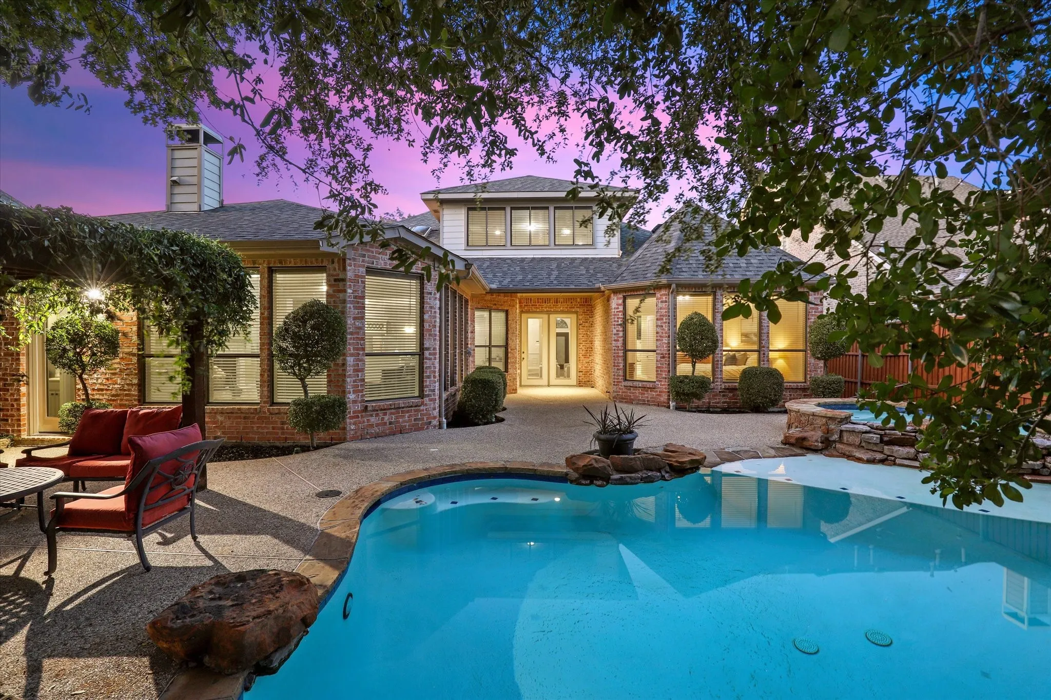 The back yard also features treed views that provide cooling shade in the back yard area.
