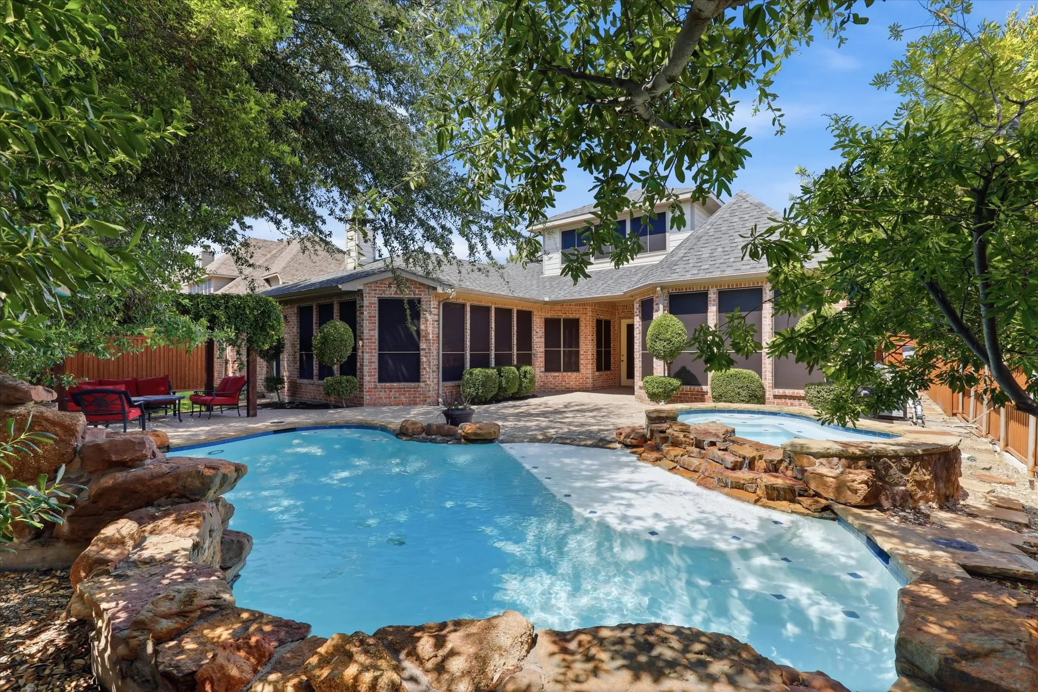 Another view of the back yard pool and spa.