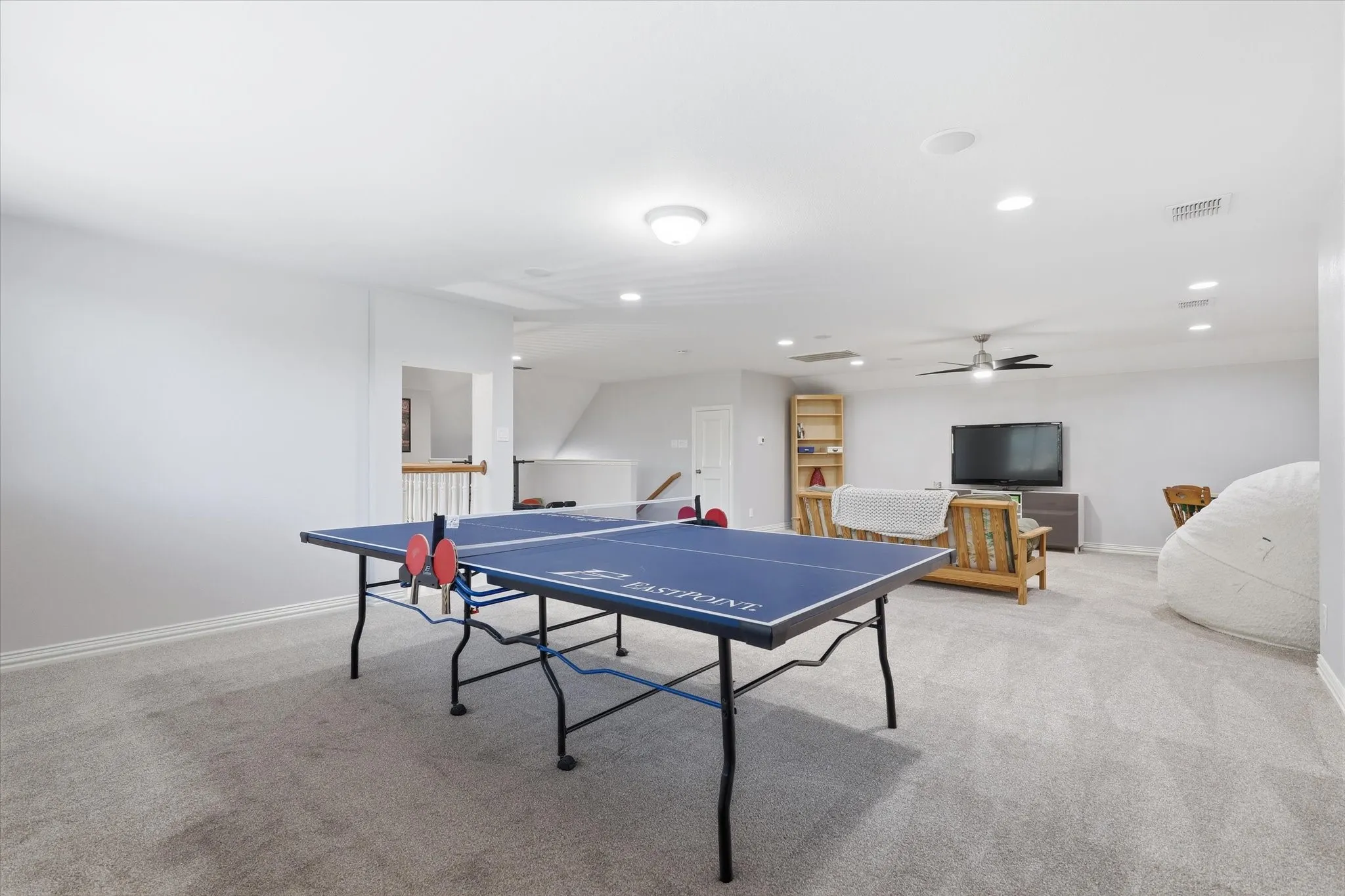 Ping Pong, Pool (or both) and/or a Golf Simulator -- there's room for everything!