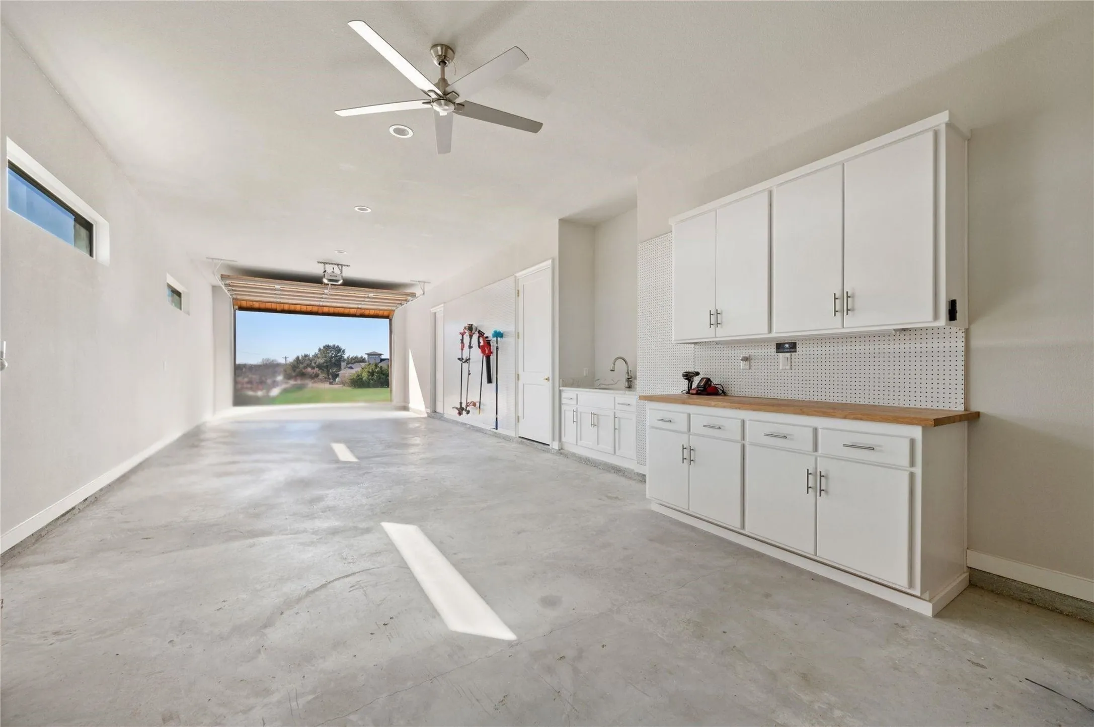 Custom Garage Layout with pull through, Additional 3 Car Garage not pictured.