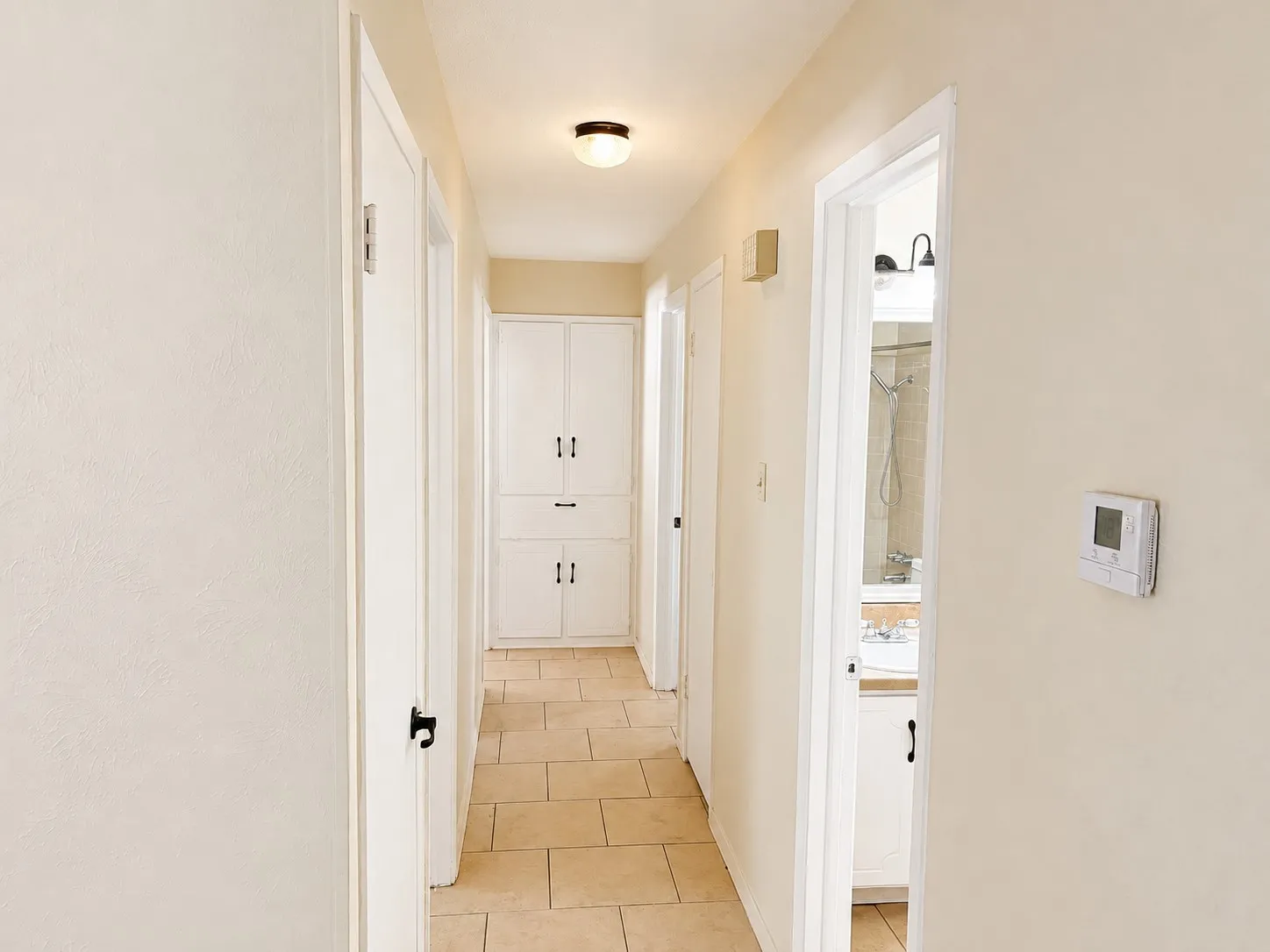 Three Bedrooms And A Guest Bath Are Down The Hallway