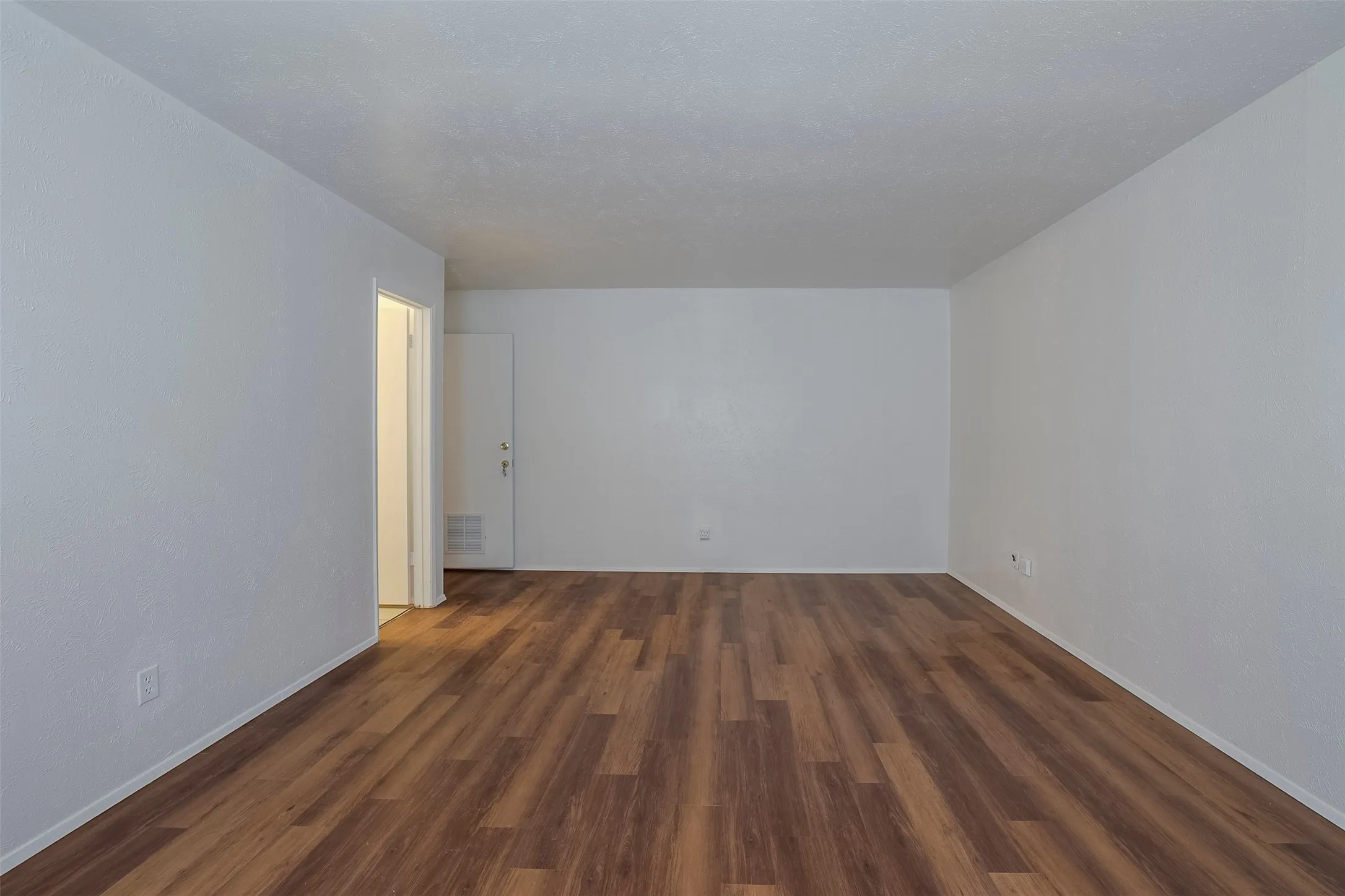 Wood-finish flooring with neutral wall tones