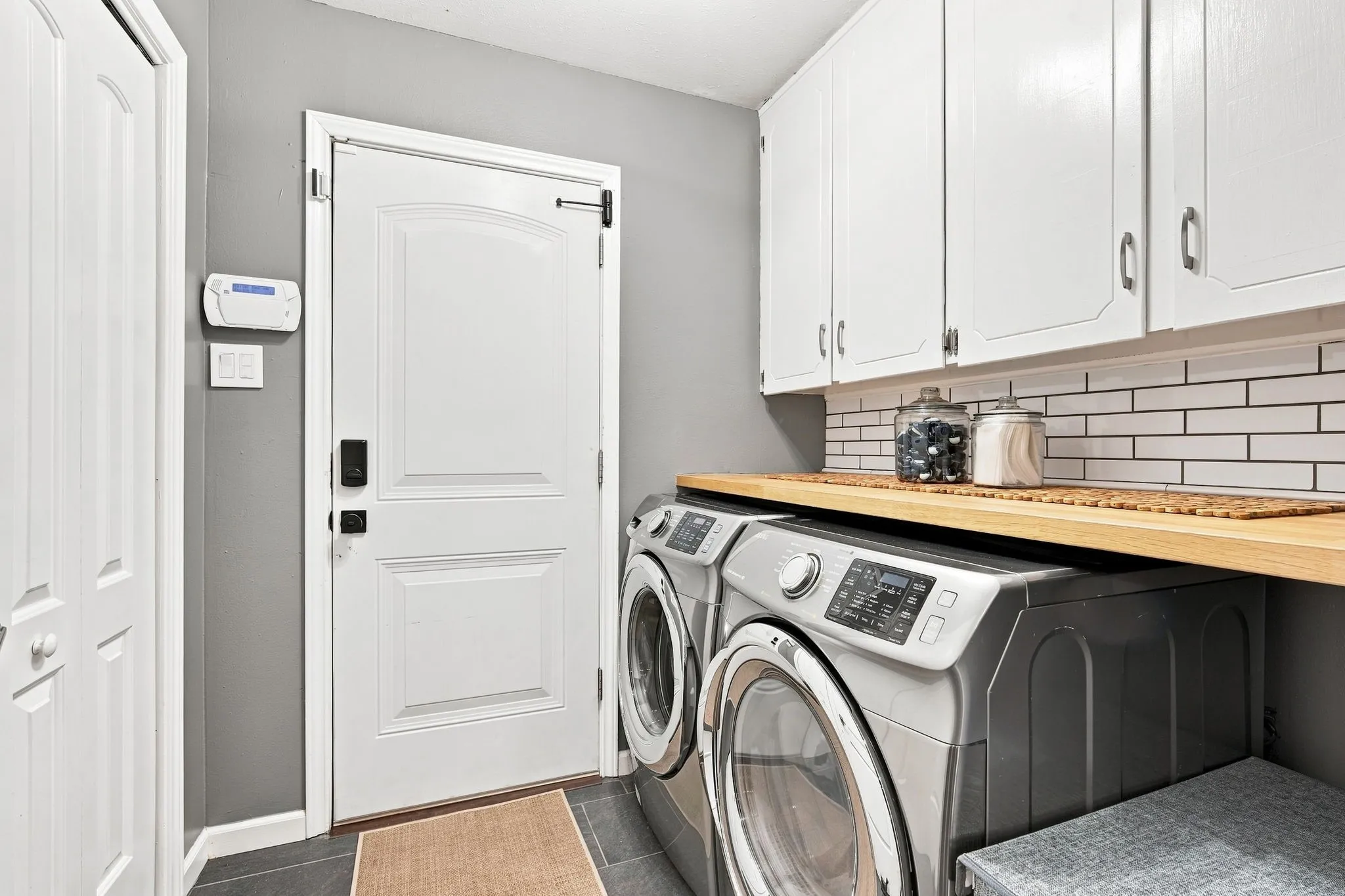 Built in cabinets and the folding shelf are so convenient. Walk-in Pantry in here too.