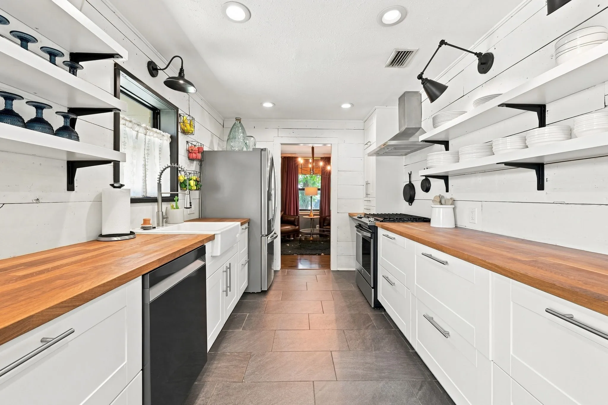Butcher block counters&  soft close cabinets.
