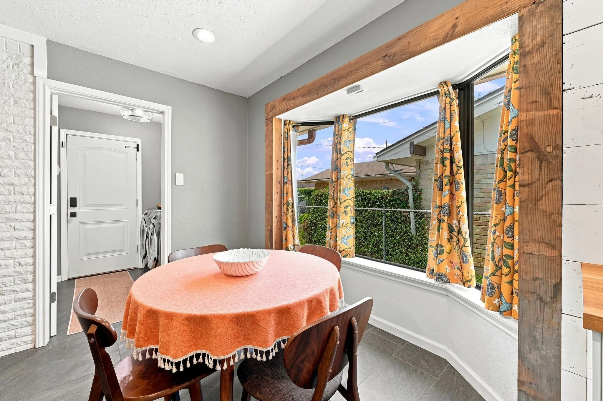 Cute kitchen nook with a bay window.