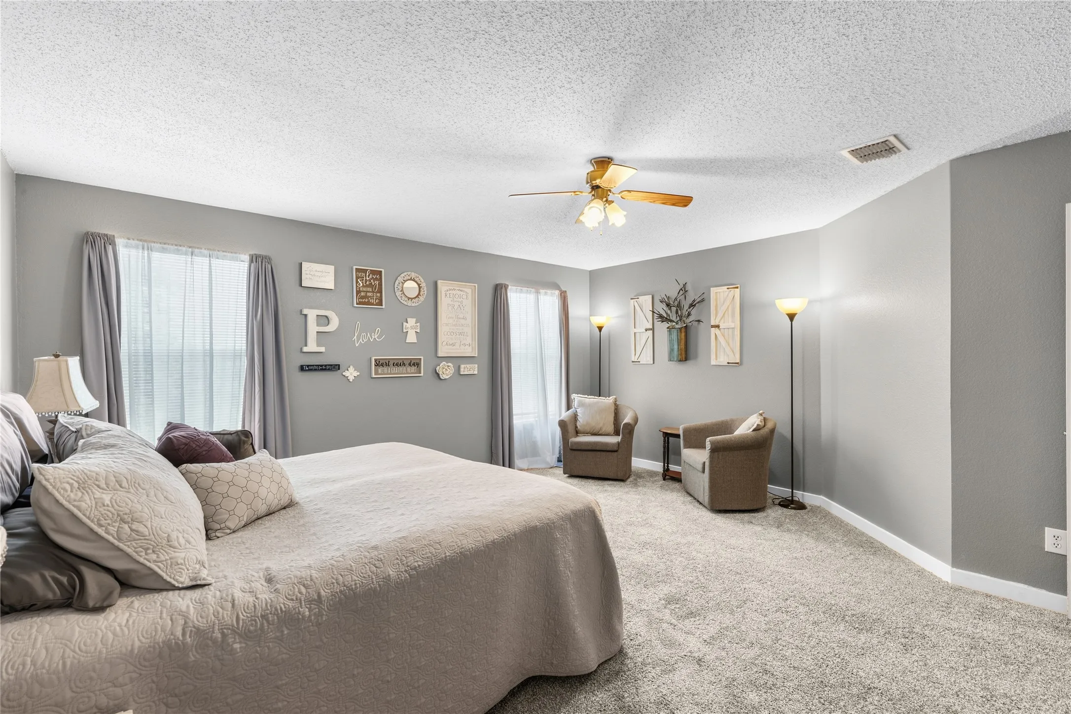 Wall-to-wall carpeting and neutral wall tones
