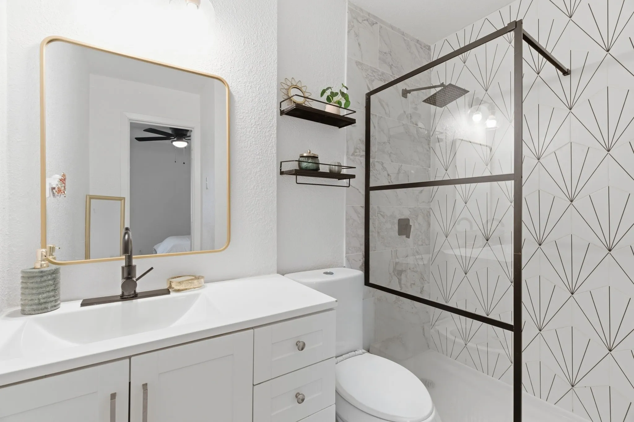 Ensuite bathroom with a shower stall and vanity
