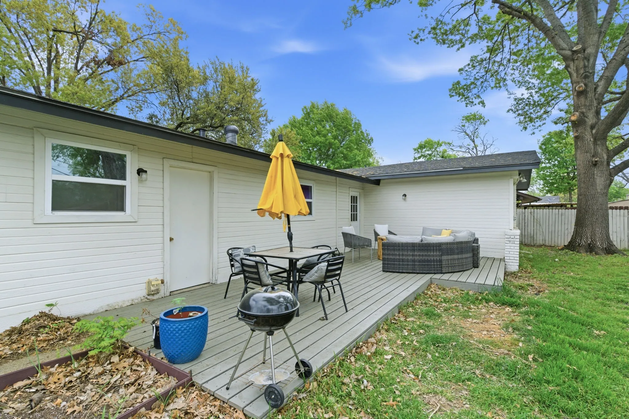 Deck with outdoor lounge area and grilling area