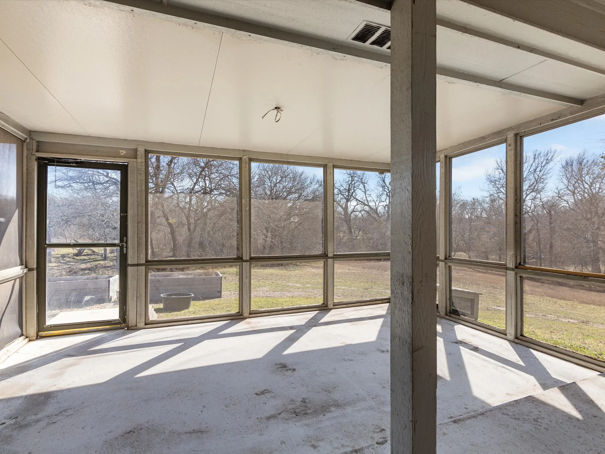 LARGE screened in back porch- you can watch the deer from this space