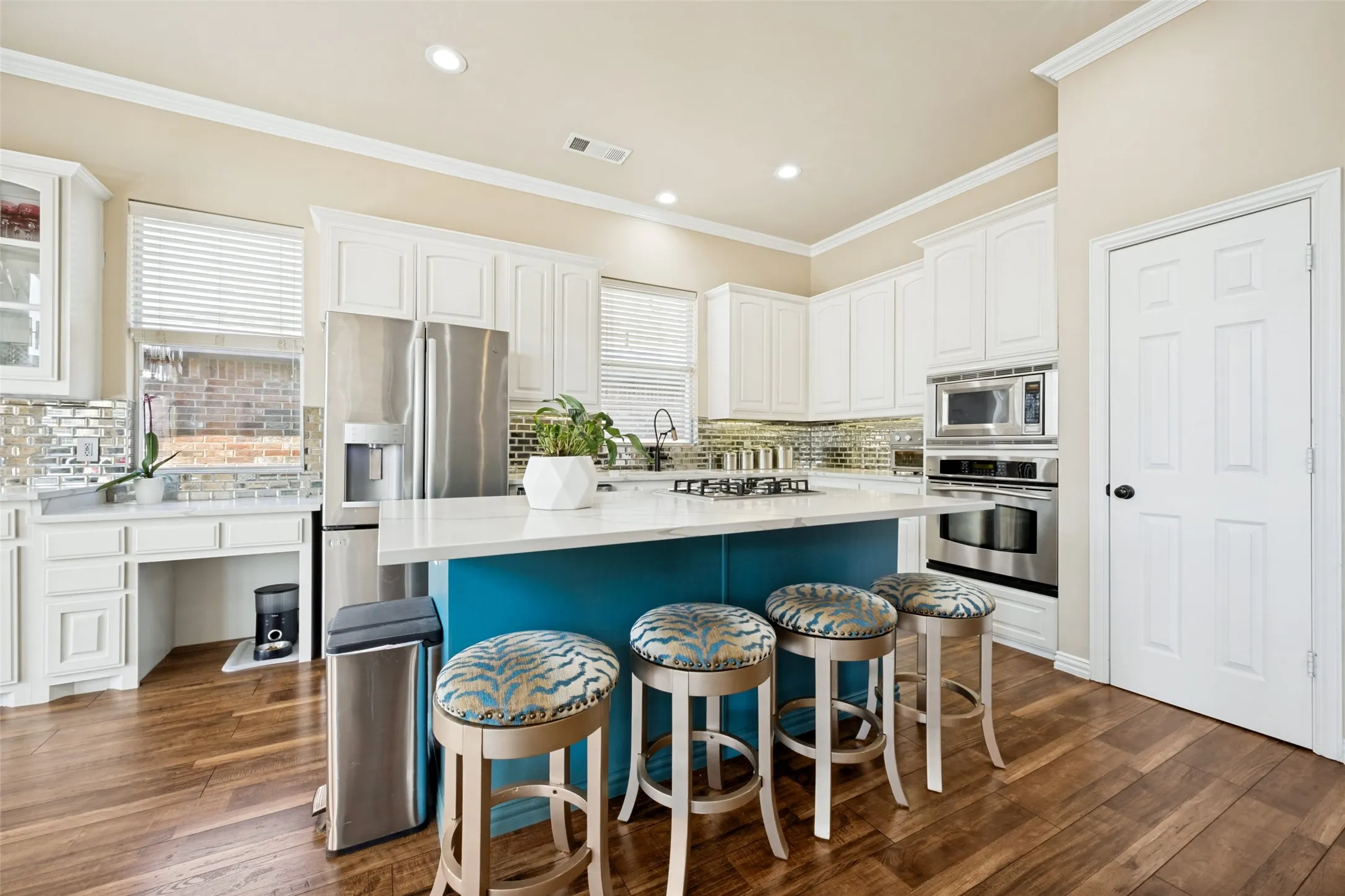 Open kitchen concept with plenty of extra seating at the breakfast bar.