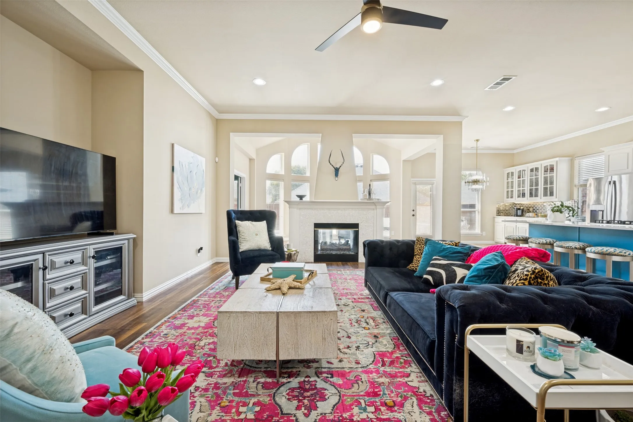 Spacious living room with double sided fireplace.