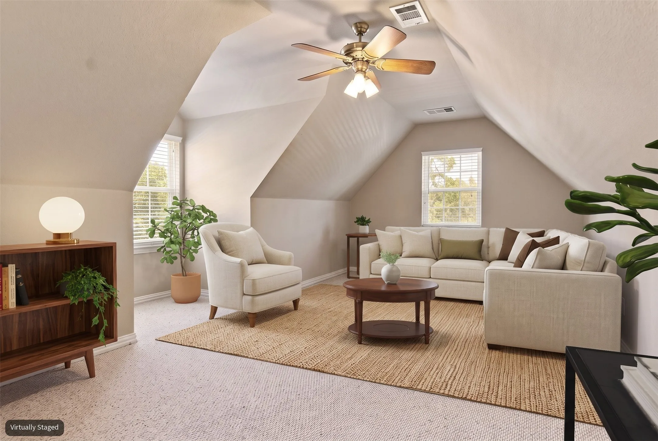 Sloped ceilings, neutral wall tones, carpet flooring, window with blinds, and a ceiling fan with integrated lighting