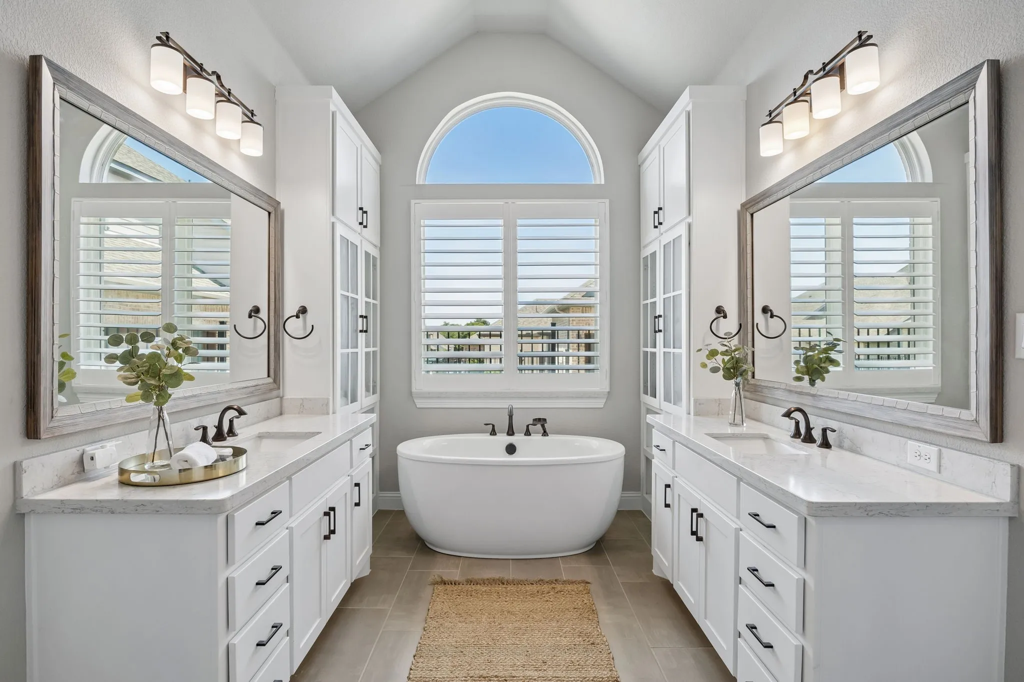 Spa like bath with built in linen cabinets