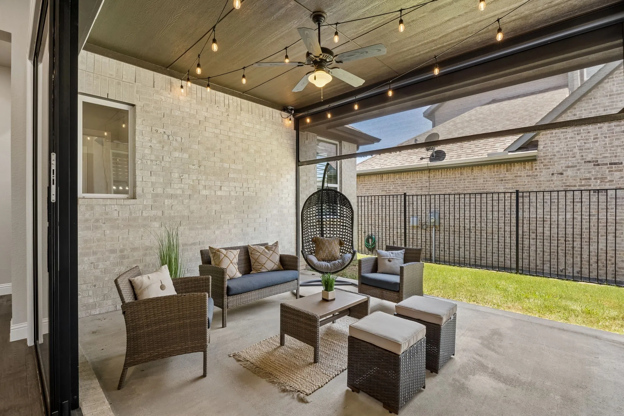 Sliders open from living room to patio