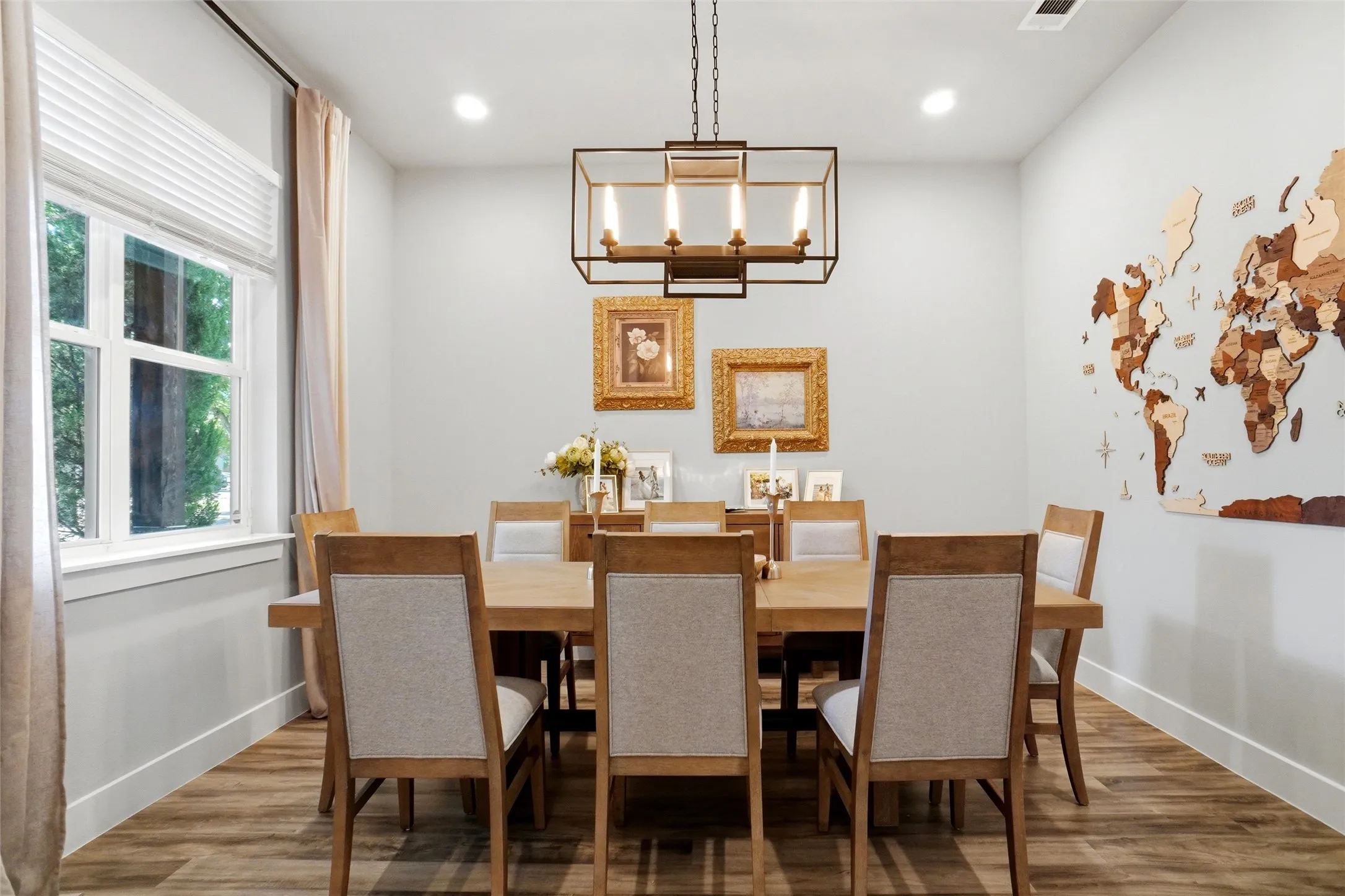 The dining area is positioned at the front of the home right off the entryway and would be perfect for a  STUDY or HOME OFFICE.  Very well appointed and out of the flow of the home.