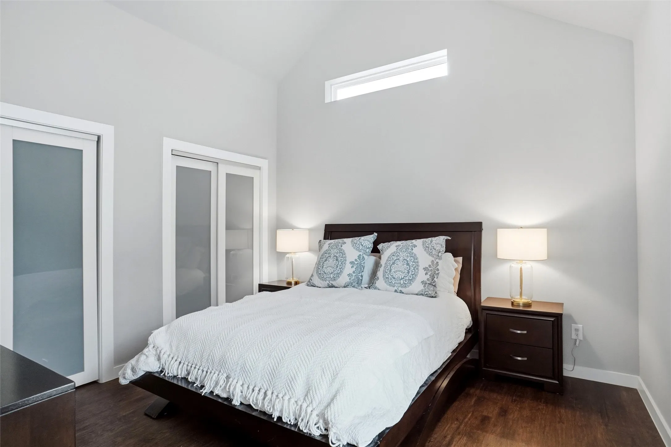 This bedroom is upstairs and offers 2 identical closets, a ceiling fan, and measures approximately 12' X 12'2.