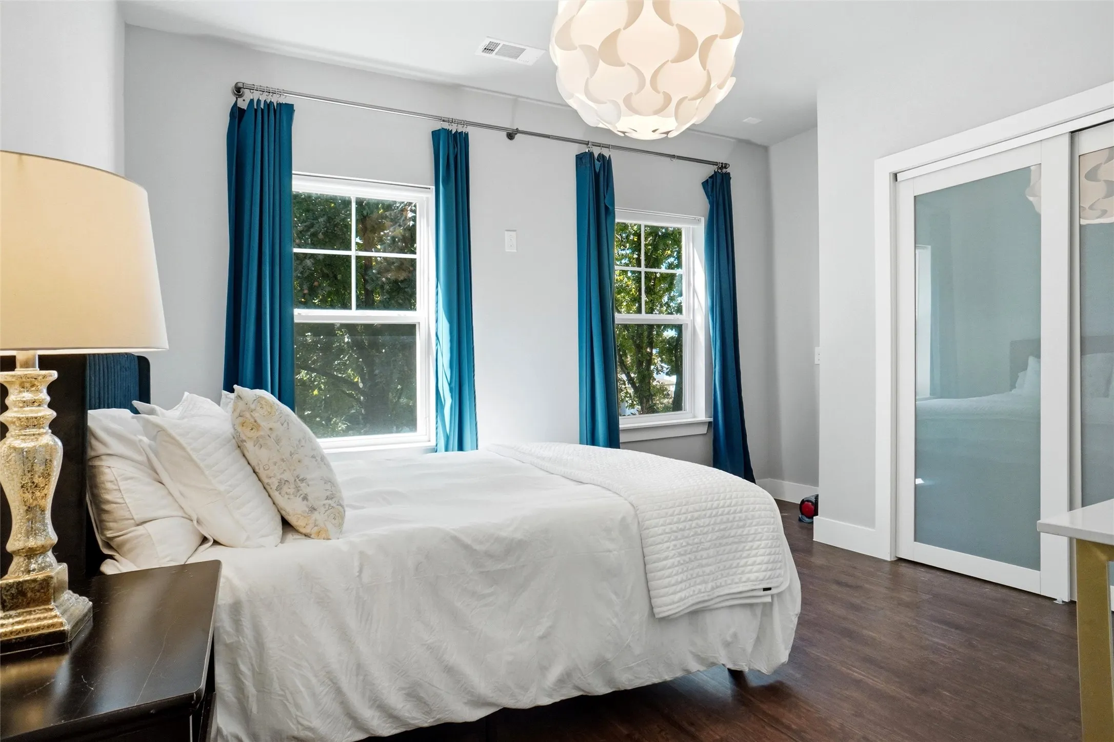 This bedroom upstairs is in the front of the home and measures approximately 14'7 X11'6".  This is an irregular shape...so measurements are not square.