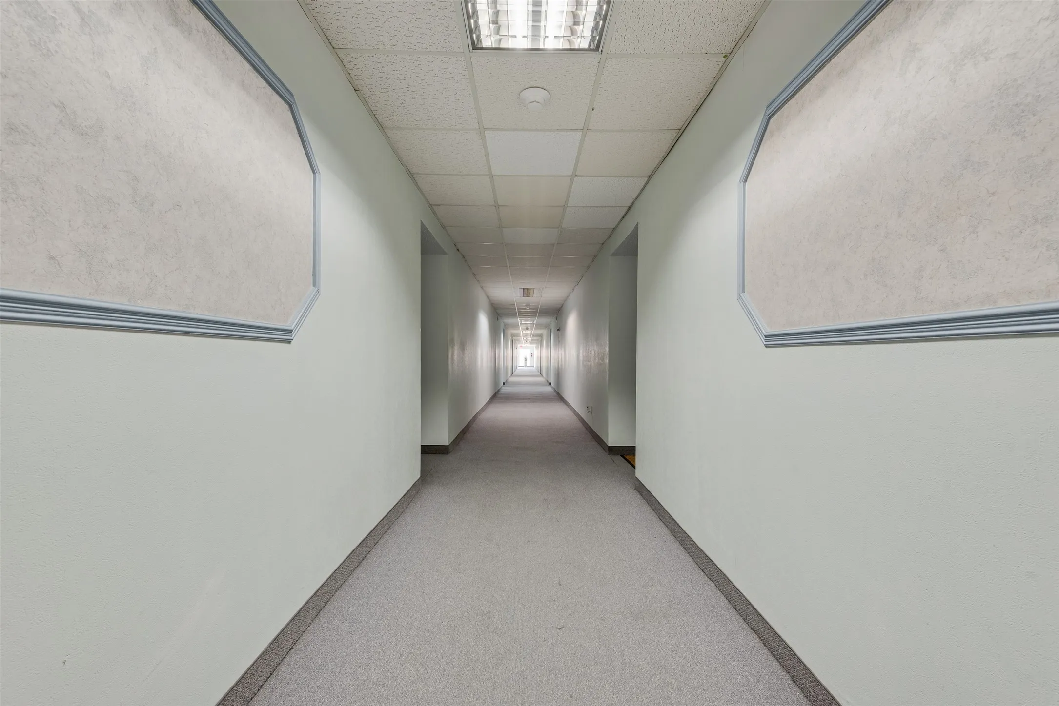 Corridor to Unit. Interior Entrances for units. Quite Building