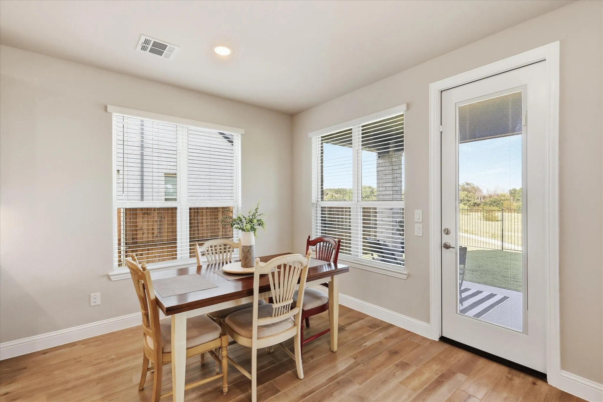 Dining space off the kitchen with views of the greenbelt!